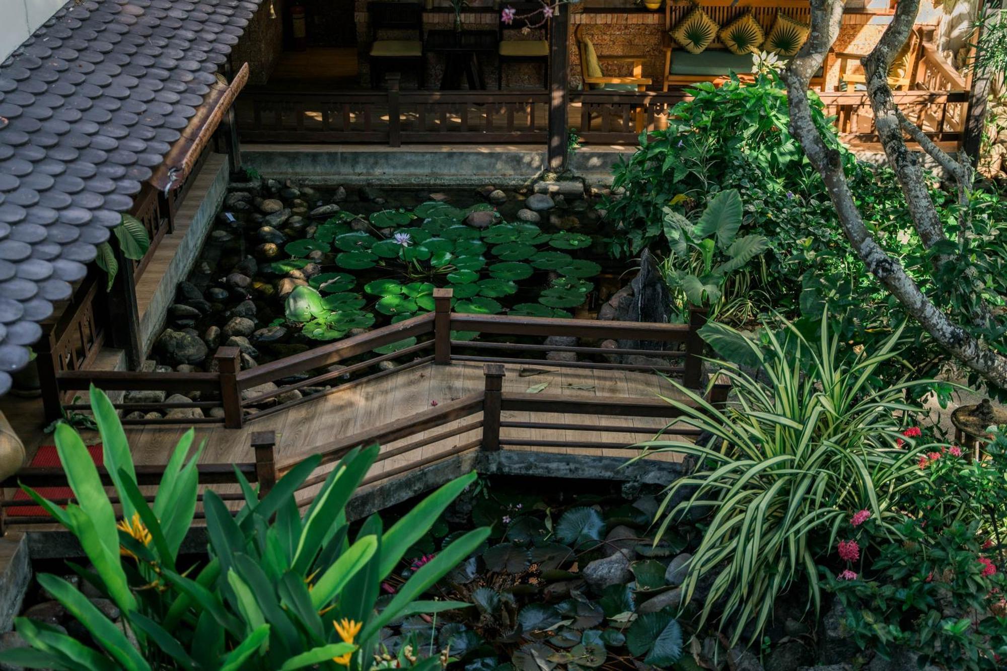 Palm Garden Beach Resort & Spa Hoi An Exterior foto A traditional Thai house