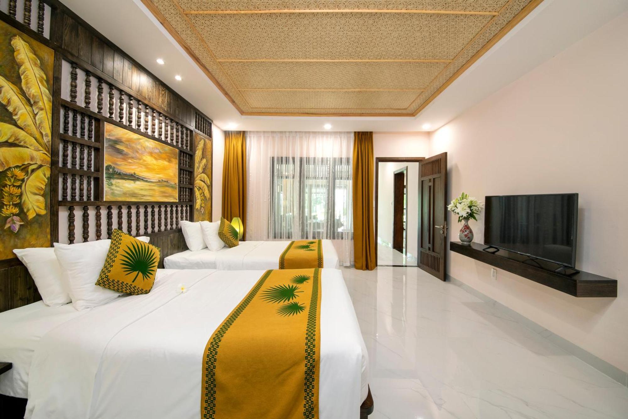 Palm Garden Beach Resort & Spa Hoi An Exterior foto Deluxe Room