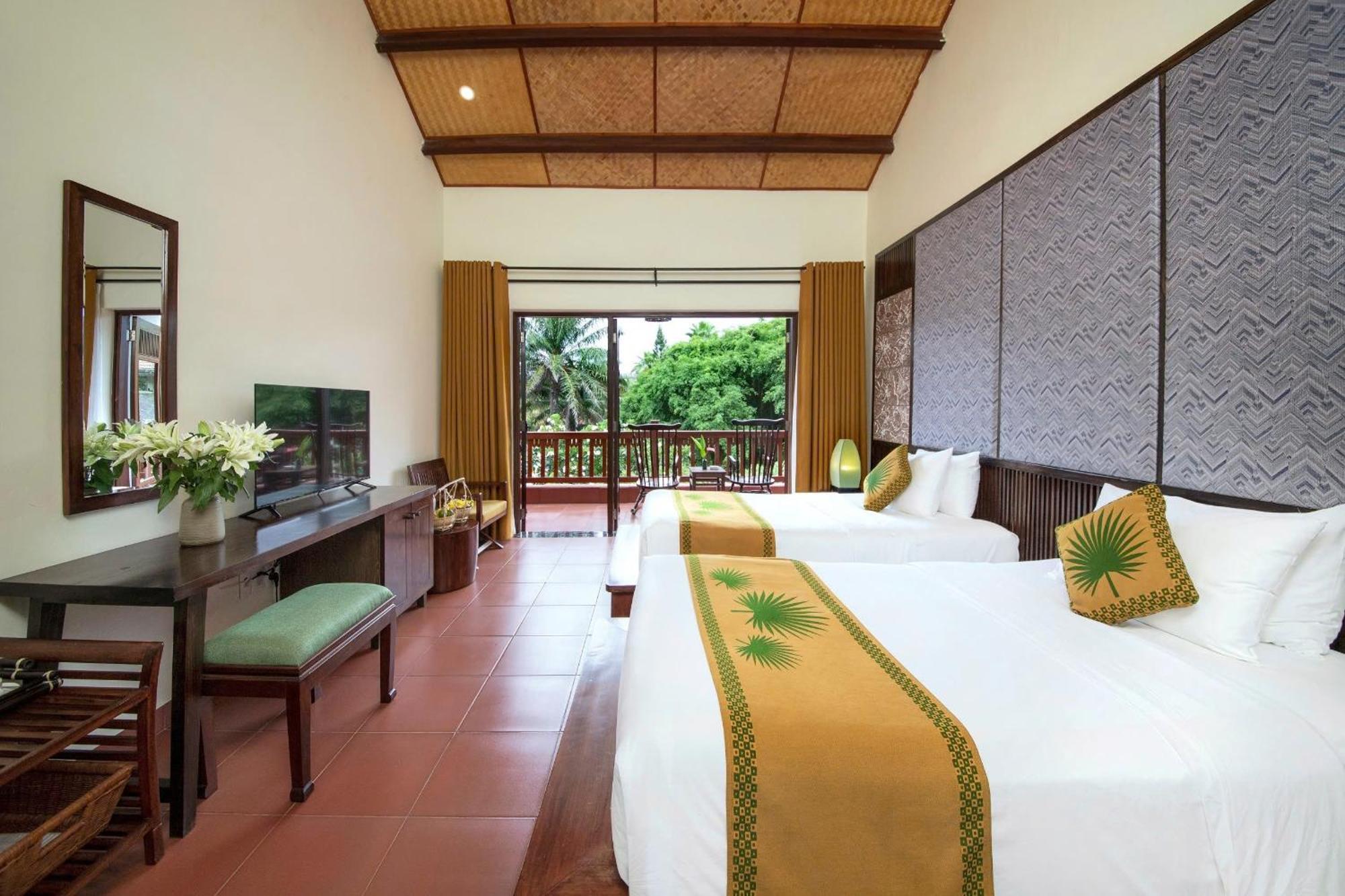 Palm Garden Beach Resort & Spa Hoi An Exterior foto Deluxe Room