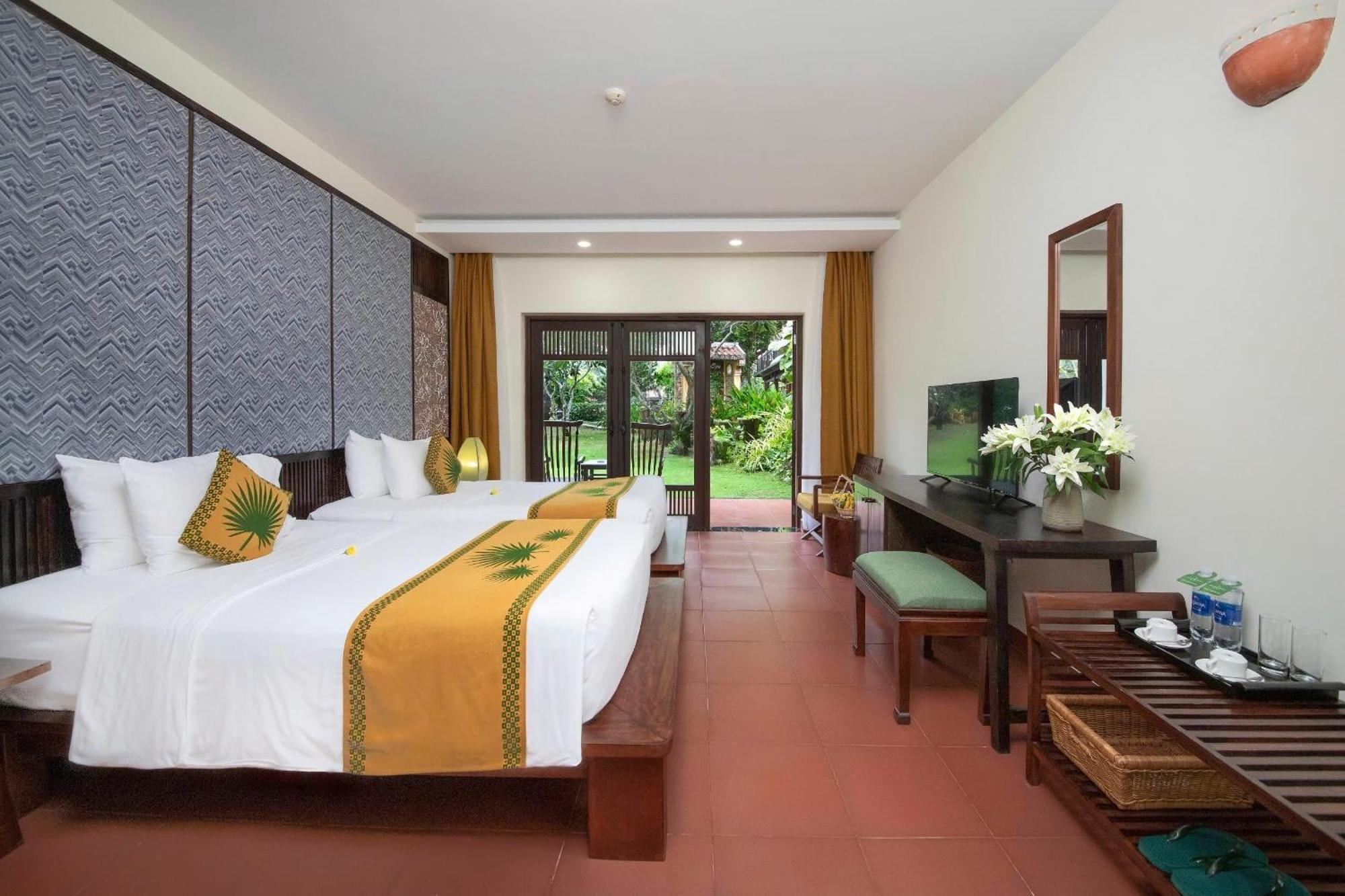 Palm Garden Beach Resort & Spa Hoi An Exterior foto Deluxe Room